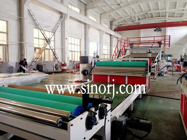 仿大理石板生產線，地板革生產線，三輥四輥集裝箱發貨中